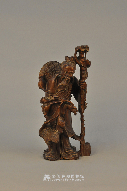 木雕老翁仙鹤像