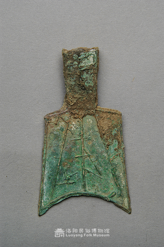 “武”字斜肩空首铜布币